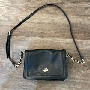 Tory Burch black purse with gold chain. Fair condition.